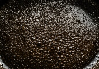 Bubbles in a Dark Liquid