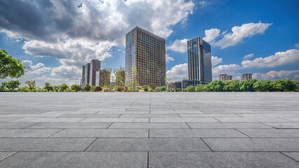 Modern Urban Cityscape with Towering Skyscrapers and Clear Blue Sky