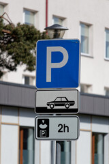 European Parking Sign with Car Front to Left Curb and Two Hours Limit