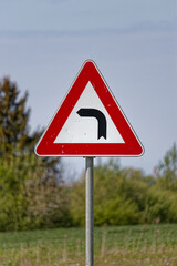European Triangular Warning Sign Left Turn Ahead