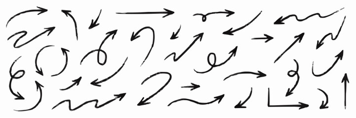 Collection of hand drawn black arrows and directional symbols