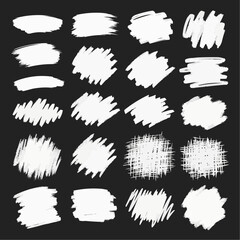 Collection of white hand drawn brush strokes and scribbles on black background