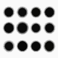 Collection of twelve black spiky starburst or sunburst shapes on white background