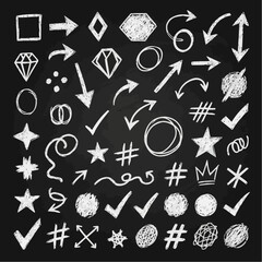 Collection of hand drawn chalk style arrows checkmarks stars and other symbols on a blackboard