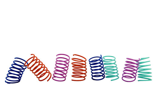 colored plastic spring cat toys in a row