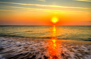 Beautiful summer sunrise over the beach