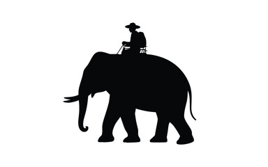 Obraz premium Silhouette of an elephant with a rider on its back