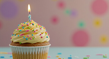 Birthday cupcake with lit candle isolated