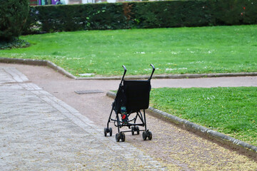 abandoned stroller in the park