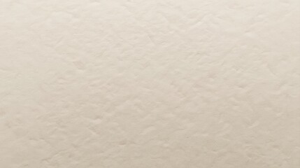 Fototapeta premium Cream colored paper with subtle texture creates a simple yet elegant backdrop perfect for various graphic designs and artistic compositions.