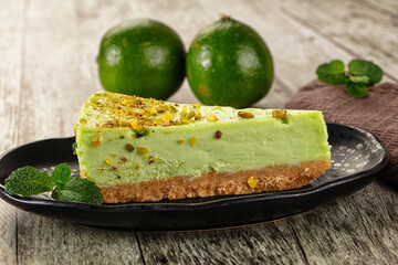 Green pistachio cheesecake served mint