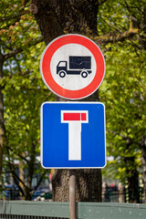 European No Trucks Sign with Dead End Ahead Road Sign