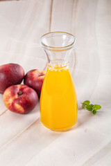 Vitamin beverage - peach juice glass