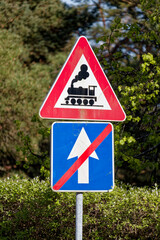 European Railway Crossing without Barrier and End of One Way Road Sign