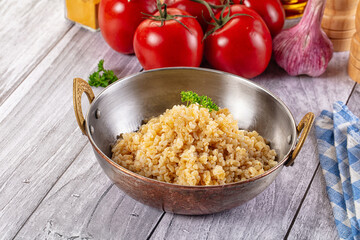 Vegan cuisine - boiled bulgur garnish