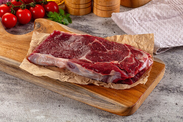 Gourmet raw rib eye steak