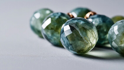 Crystal faceted Christmas baubles in Alexandrite green color close-up  
