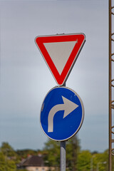 European Give Way Sign with Mandatory Right Turn Traffic Sign