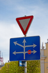 European Give Way Sign with Lane Directions Showing Right Turn Ban and Multiple Allowed Routes