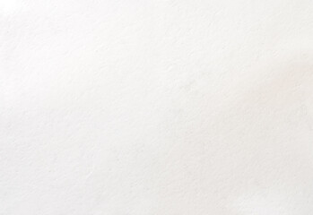 Plano cerrado de superficie blanca texturizada, sin objetos visibles, fondo neutro, estilo minimalista y limpio.La superficie blanca sugiere silencio visual: espacio vacío, textura sutil y potencial.