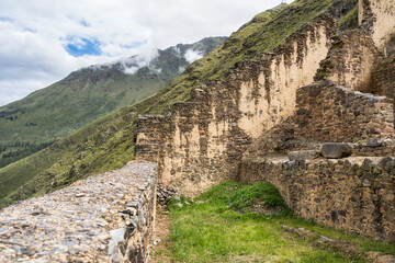 Fototapeta premium Scenic landscape view with the inca ruins at Ollantaytambo Archeological Site in the Sacred Valley of the Incas, Peru.