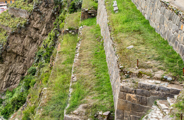 Scenic landscape view with Ollantaytambo Archeological Site in the Sacred Valley of the Incas, Peru.