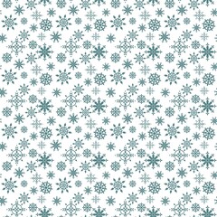 Winter snowflake pattern on white background with intricate designs and various sizes of snowflakes