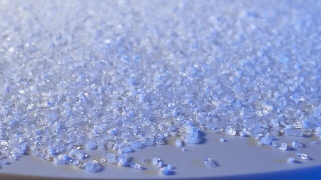 Salt crystals. Magnesium sulfate. Epsom salt. Salt. Salt particles. Slow motion. High-quality 4K video.