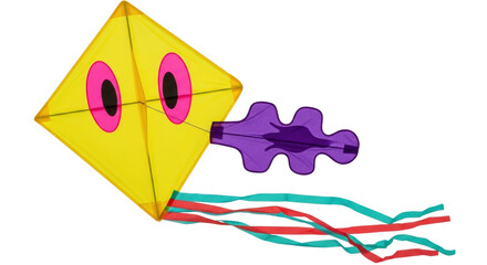 Isolated yellow kite with pink eyes, purple handle, and red and blue streamers aloft