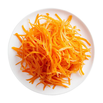 top view of julienne sliced carrots on a white plate for cooking preparation