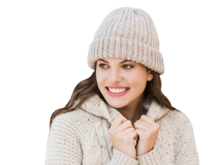 Beautiful young woman winter portrait isolated in transparent PNG, Smiling student girl wearing warm clothes over white background looking away to copyspace
