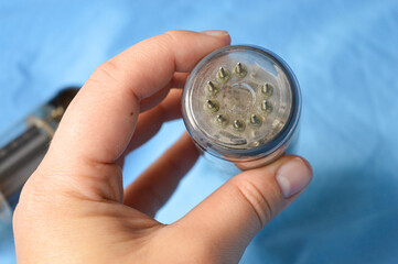 vintage vacuum tubes on blue background, retro electronic components used in radios and amplifiers,...
