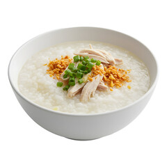 Chicken congee in a white bowl garnished with scallions and fried garlic set on white or transparent background