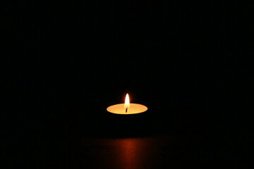 Single Candle Burning in the Dark