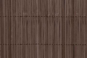 abstract backdrop: brown mat made of woven bamboo sticks