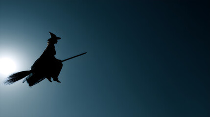 Witch silhouette flying across minimal gradient sky, split lighting, high-key exposure, rule of thirds, matte finish