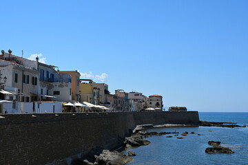 Cityscape of historical part of Alghero town. Waterfront of Alghero town in Sardinia. Alghero old town, street view, Sardinia, Italy