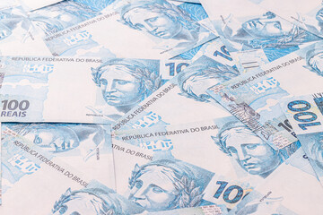 100 Brazilian real banknotes, one hundred real notes, Brazilian money, background, texture