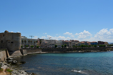 Cityscape of historical part of Alghero town. Waterfront of Alghero town in Sardinia. Alghero old town, street view, Sardinia, Italy
