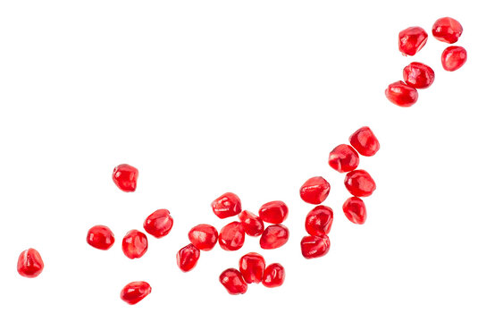 Fresh pomegranate seeds isolated on a white background, top view. Garnet grains. Red seeds of pomegranate.