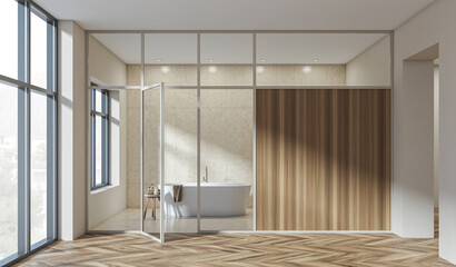 Contemporary bathroom interior with glass wall, freestanding bathtub, wooden panel, and herringbone...
