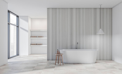 Minimalist bathroom interior with freestanding bathtub, wooden stool, pendant light, and striped accent wall on a bright tiled floor. 3D Rendering