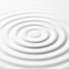 A serene image of gentle water ripples on a white surface, creating a calming and minimalist aesthetic.
