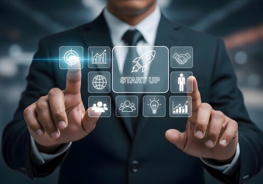 Man in suit interacting with digital interface showing startup and business related icons displayed - Powered by Adobe