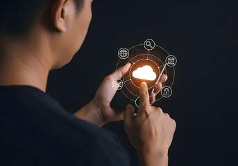 Man interacting with a digital cloud interface with various icons on a dark background image view