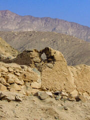 Vintage film photograph of ancient pre-Columbian ruins under the Peruvian sun.
