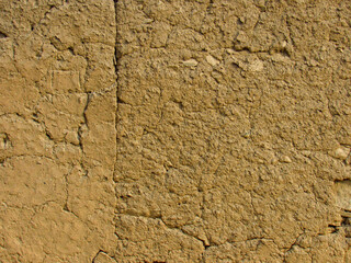 Detailed macro of aged ceramic and mud wall from pre columbian heritage site.
