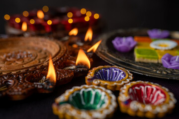 Traditional handcrafted clay diyas burning with warm flame, symbolizing positivity and spirituality during Hindu festival Diwali. Perfect festive footage for greetings, cultural backgrounds.