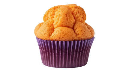 Isolated orange cupcake in purple wrapper, sweet baked treat for dessert or snack at bakery
