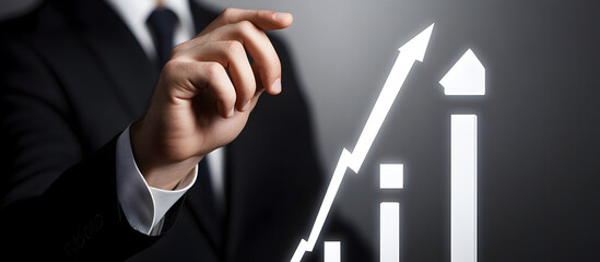 businessman drawing a graph on the screen